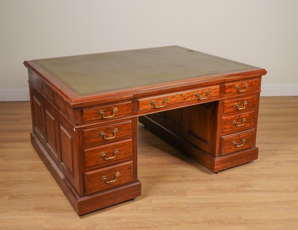 A MAHOGANY EIGHTEEN DRAWER PEDESTAL PARTNER’S DESK