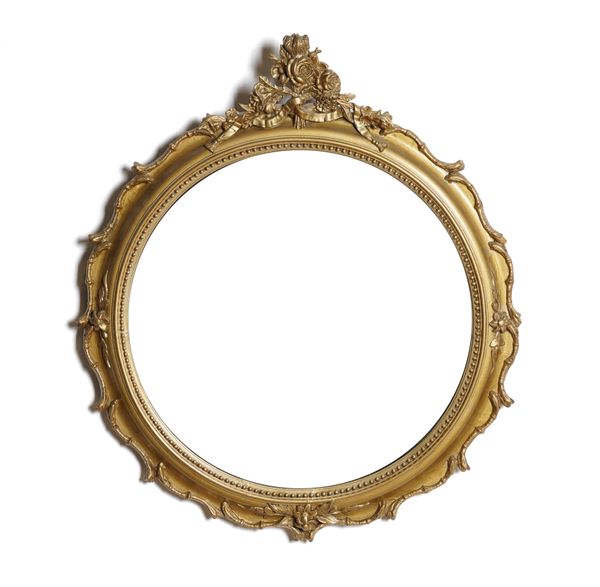 A VICTORIAN FLORAL MOULDED GILT FRAMED CONVEX WALL MIRROR