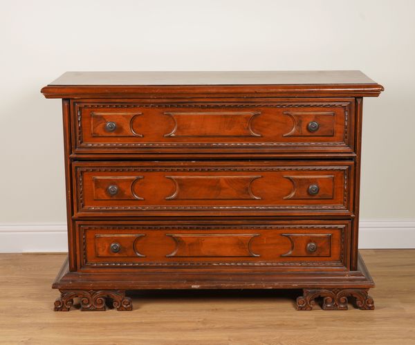 A WALNUT CHEST OF THREE LONG DRAWERS OF 17TH CENTURY ITALIAN STYLE