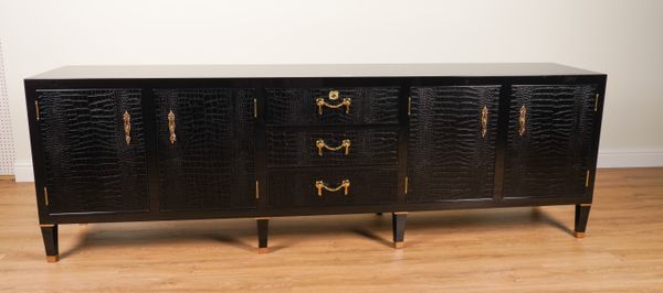 RALPH LAUREN; A BROOK STREET BLACK LACQUER PARCEL GILT SIDE CABINET WITH FAUX CROCODILE LEATHER VENEERED DRAWERS AND CUPBOARDS