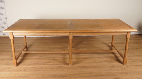 FLAMANT, IN THE MANNER OF HEALS; A CHARTWELL DESIGN OAK CENTRE TABLE ON GUN BARREL TURNED SUPPORTS