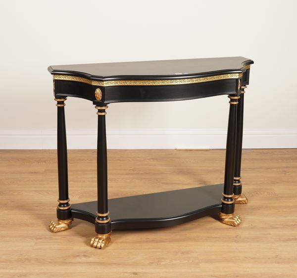 AN EMPIRE REVIVAL PARCEL GILT BLACK LACQUER SHAPED CONSOLE TABLE