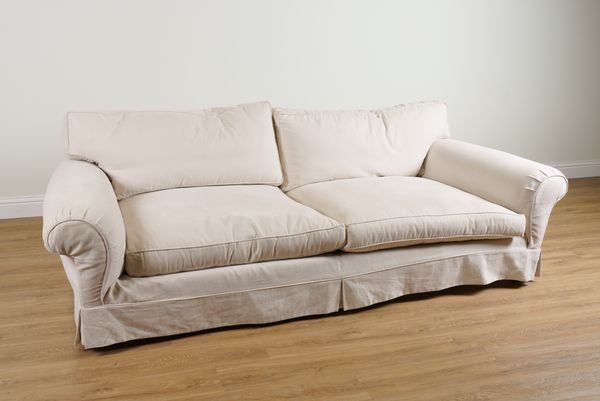 DURESTA; A LARGE DEEP SEAT SOFA WITH LOOSE CREAM COVERS