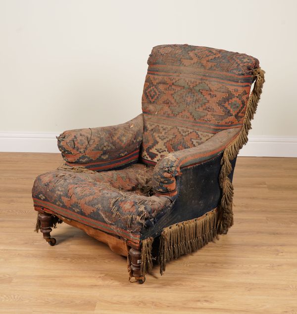 A VICTORIAN MAHOGANY FRAMED EASY ARMCHAIR