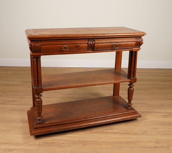 A 19TH CENTURY FRENCH OAK TWO DRAWER THREE TIER SERVING BUFFET