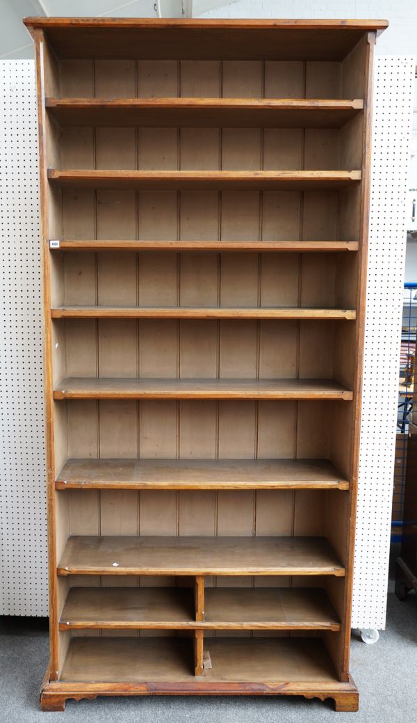 A MAHOGANY FLOOR STANDING OPEN NINE TIER BOOKCASE