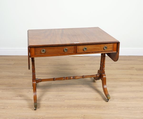 A LATE GEORGE III MAHOGANY TWO DRAWER SOFA TABLE