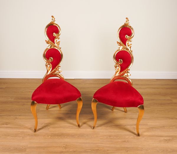 CHRISTOPHER GUY; A PAIR OF LE PREMIER RED SUEDE UPHOLSTERED GILT FRAMED SIDE CHAIRS (2)