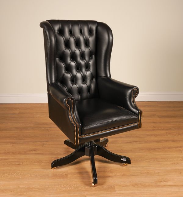 RALPH LAUREN; A CHAIRMAN BRASS STUDDED BLACK LEATHER UPHOLSTERED WINGBACK SWIVEL OFFICE CHAIR