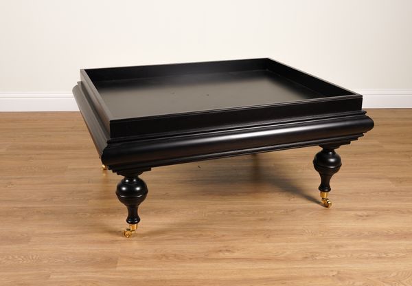 PROBABLY RALPH LAUREN; AN EBONISED BOHEMIAN COCKTAIL/COFFEE TABLE