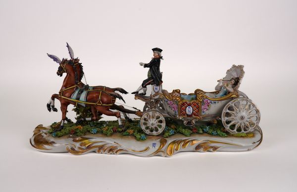 A CAPODIMONTE GROUP OF A HORSE DRAWN CARRIAGE