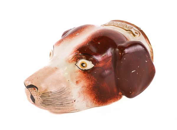 A STAFFORDSHIRE POTTERY HOUND HEAD STIRRUP CUP