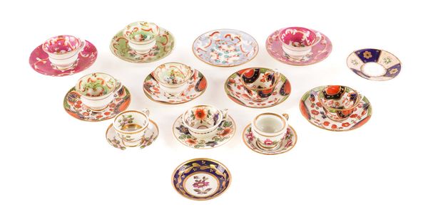 A GROUP OF ENGLISH PORCELAIN MINIATURE CUPS AND SAUCERS (23)