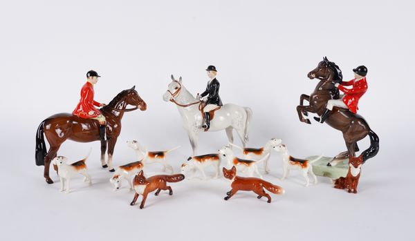 A GROUP OF BESWICK FOX HUNTING FIGURES (13)