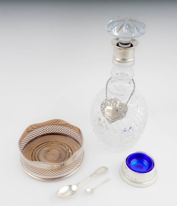 A SILVER MOUNTED FACETED GLASS DECANTER (5)