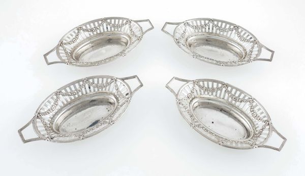 A SET OF FOUR SILVER TWIN HANDLED BONBON DISHES (4)