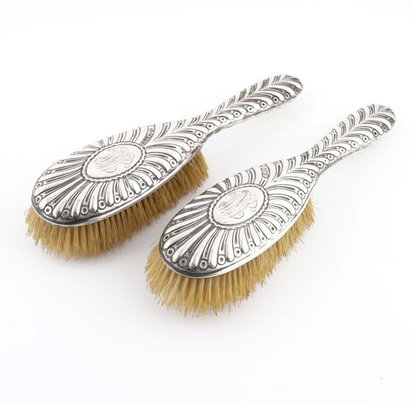 A PAIR OF VICTORIAN SILVER MOUNTED HAIRBRUSHES (2)