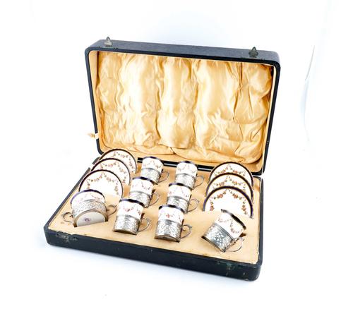 A SILVER MOUNTED CABARET SET