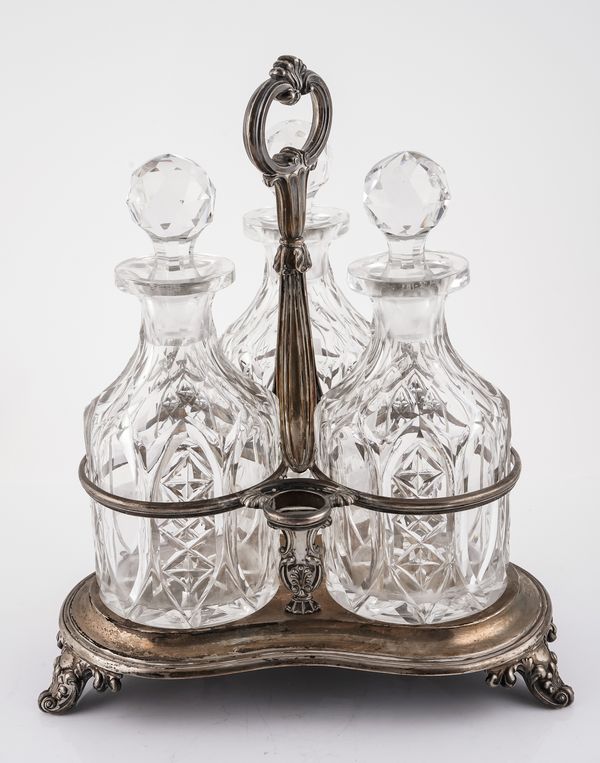 A VICTORIAN THREE BOTTLE DECANTER STAND (4)