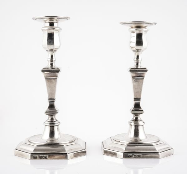 A PAIR OF SILVER TABLE CANDLESTICKS (2)