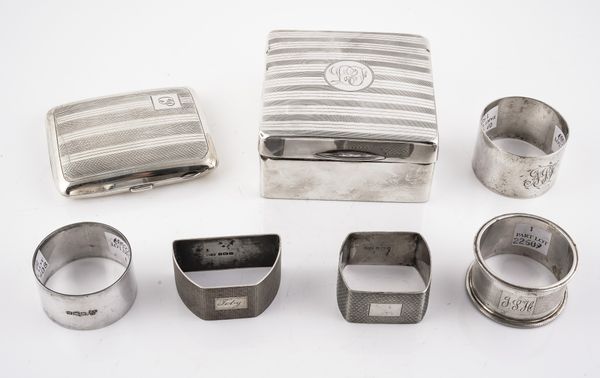 FIVE SILVER NAPKIN RINGS AND TWO FURTHER ITEMS (7)