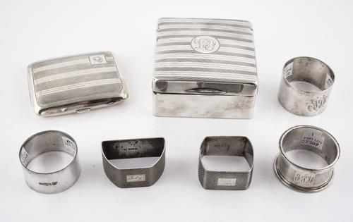 FIVE SILVER NAPKIN RINGS AND TWO FURTHER ITEMS (7)