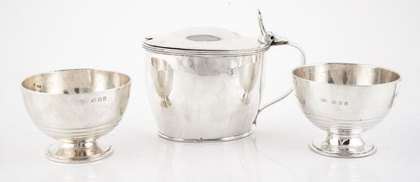 A GEORGE III MUSTARD POT AND TWO SIMILAR SILVER SALTS (3)