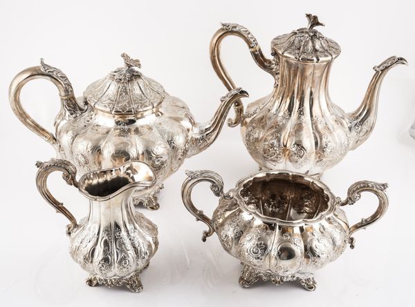 A SILVER COMPOSITE FOUR PIECE TEA SET