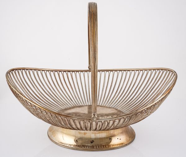 A GEORGE III SILVER CAKE OR BREAD BASKET