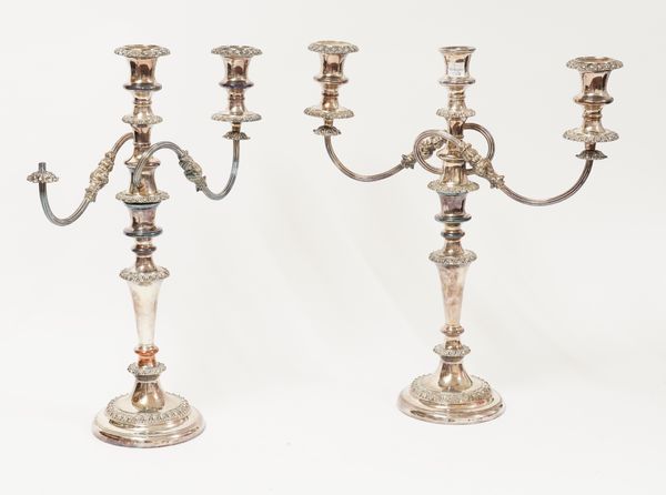 A PAIR OF PLATED THREE LIGHT TABLE CANDELABRA (3 including loose sconce)