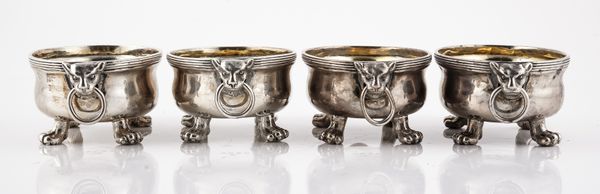 A SET OF FOUR GEORGE III SILVER OVAL TWIN HANDLED SALTS (4)