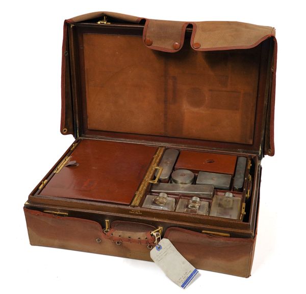 A FRENCH SILVER MOUNTED TRAVELLING TOILET CASE