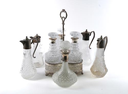 A PLATED ON COPPER DECANTER STAND WITH THREE FACETED GLASS DECANTERS AND FIVE FURTHER ITEMS (9)