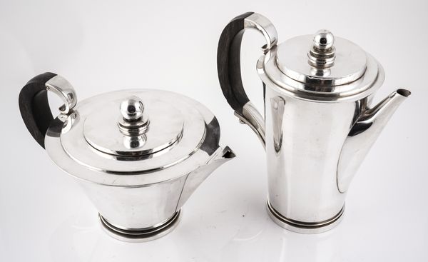 A GEORG JENSEN SILVER TEAPOT AND A MATCHING HOT WATER JUG (2)