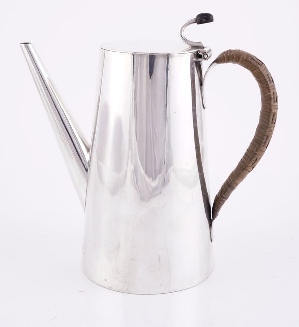 A VICTORIAN SILVER HOT WATER JUG