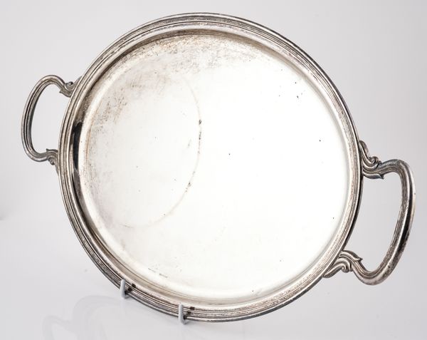 AN OVAL TWIN HANDLED TRAY