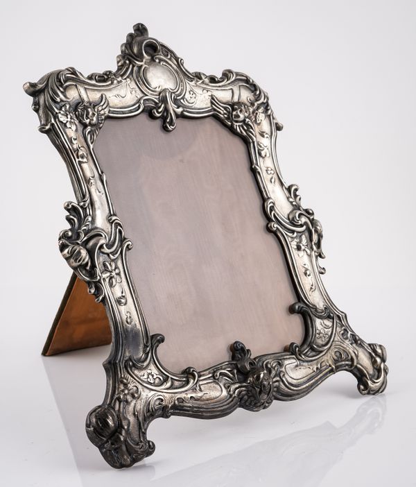 A SHAPED RECTANGULAR PHOTOGRAPH FRAME