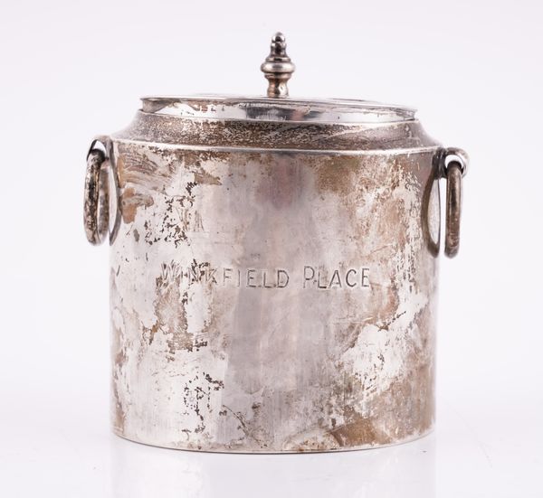 A SILVER OVAL TWIN HANDLED TEA CADDY