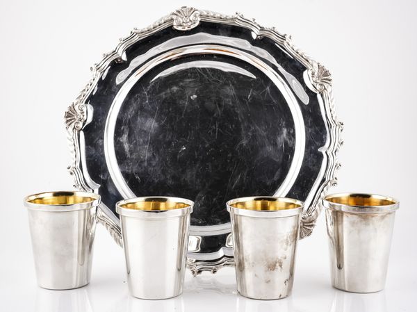 A SILVER SALVER AND A SET OF FOUR SILVER TUMBLERS (5)