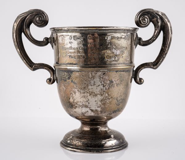 A SILVER TWIN HANDLED TROPHY CUP