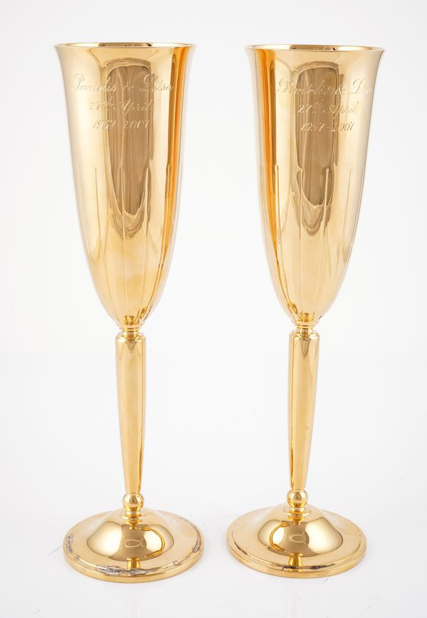 A PAIR OF SILVER GILT CHAMPAGNE FLUTES (2)