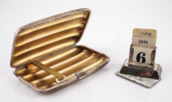 A SILVER CIGAR CASE AND A SILVER MOUNTED CALENDAR (2)