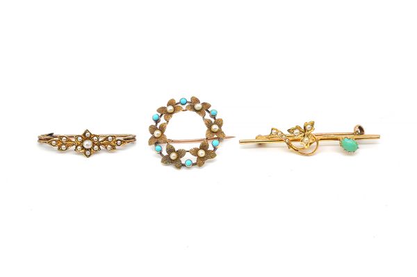 THREE GOLD AND GEM SET BROOCHES (3)