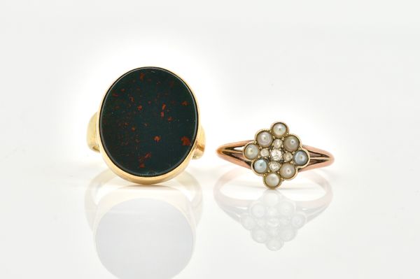 A BLOODSTONE SIGNET RING AND A PEARL AND DIAMOND RING (2)