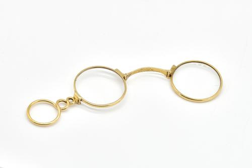 A PAIR OF VICTORIAN GILT METAL FOLDING LORGNETTES