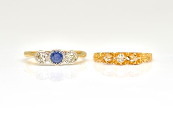 TWO GOLD AND GEM SET RINGS (2)