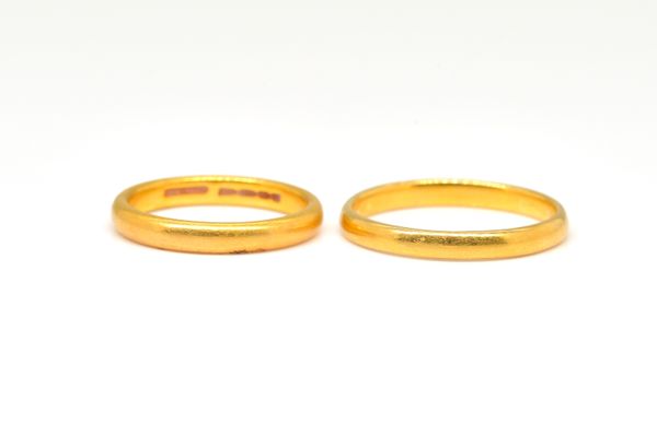 TWO PLAIN GOLD WEDDING BANDS (2)