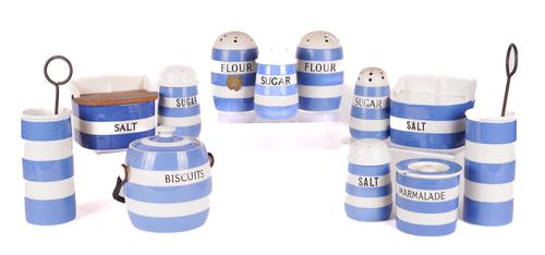 T.G. GREENE: CORNISHWARE ITEMS INCLUDING A BISCUIT JAR, SUGAR, SALT AND FLOUR SHAKERS AND SALT BOXES (12)