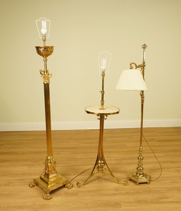 A BRASS HEXAGONAL BASED READING LAMP, A BRASS STANDARD LAMP WITH MARBLE TABLE AND ANOTHER LAMP (3)