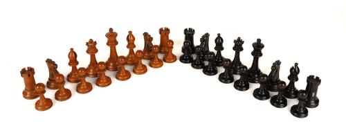 A VICTORIAN STAUNTON PATTERN BOXWOOD AND EBNOISED CHESS SET